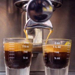 close up of double espresso shots brewing